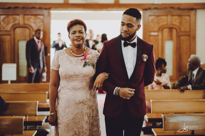 Javon walking into the church with his mother