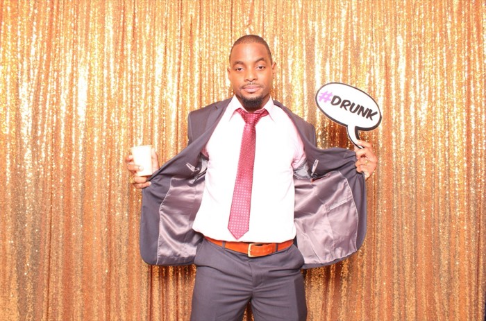 A guest clowning for the photo booth camera